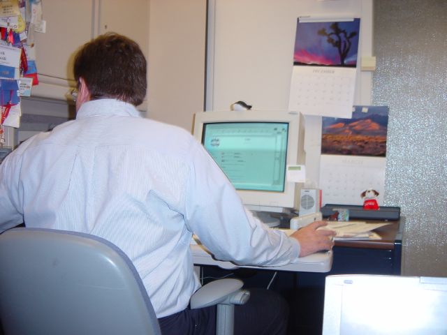 Dad, at his Desk in Lucent, Reading Email
