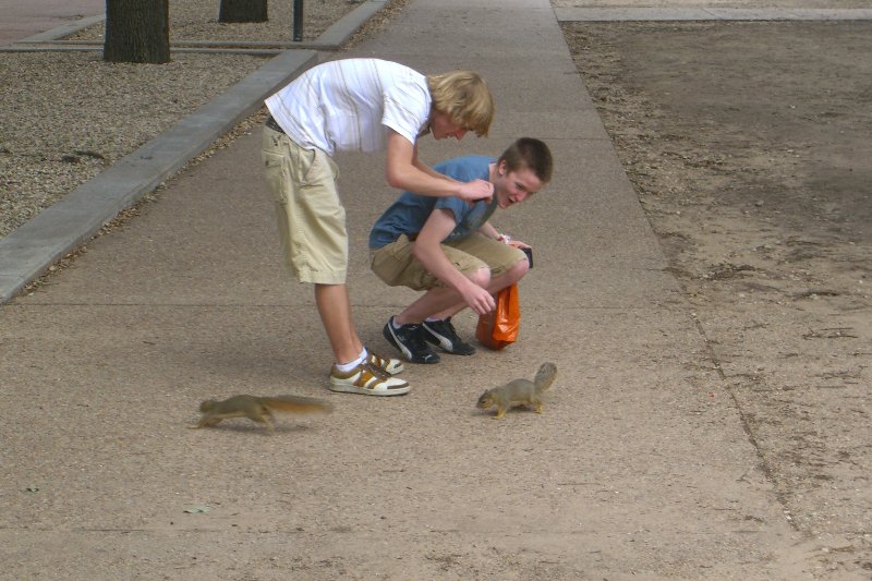 CIMG8089.JPG - Dan and Mike with campus squirrels