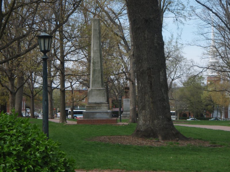 P4020102.JPG - Joseph Caldwell, UNC’s first president. obelisk monument in McCorkle PlaceUniversity Presbyterian Church of Chapel Hill (far right background)