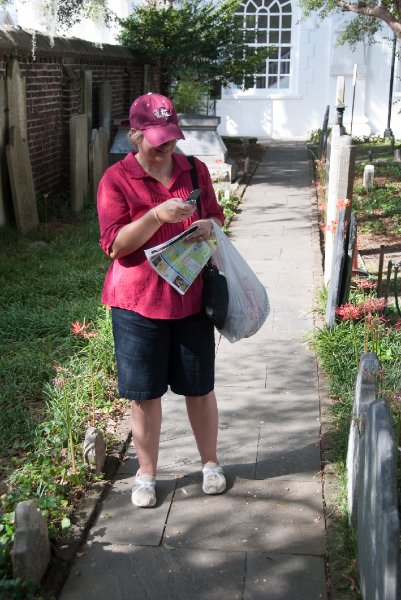 Charleston100309-9743.jpg - Cathie sending Liz a picture in Saint Michael’s Churchyard cemetery