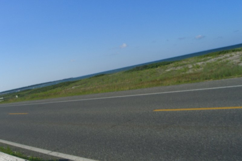 CIMG1767.jpg - Biking North on Edgartown Oak Bluffs Rd, view looking East at  Edgartown Harbour / Nantucket Sound