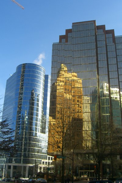Vancouver020309-1424.jpg - AXA Place (right), Waterfront Centre (left), Marine Building (reflection)
