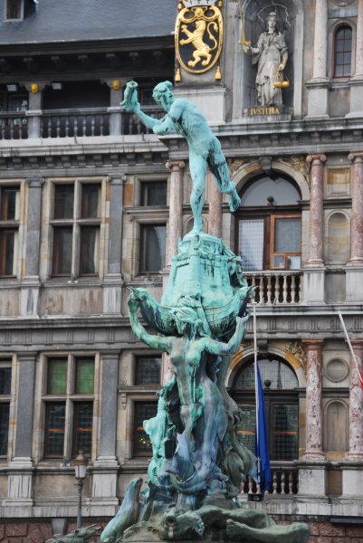 Antwerp021610-1453.jpg - Statue of Silvius Brabo by Jef Lambeaux, 1887, located in the center of the Grote Markt. Stadhuis / City Hall (background)
