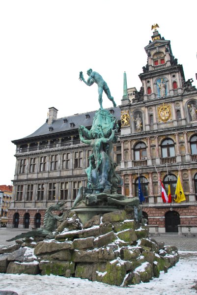 Antwerp021610-1456.jpg - Statue of Silvius Brabo by Jef Lambeaux, 1887, located in the center of the Grote Markt. Stadhuis / City Hall (background)