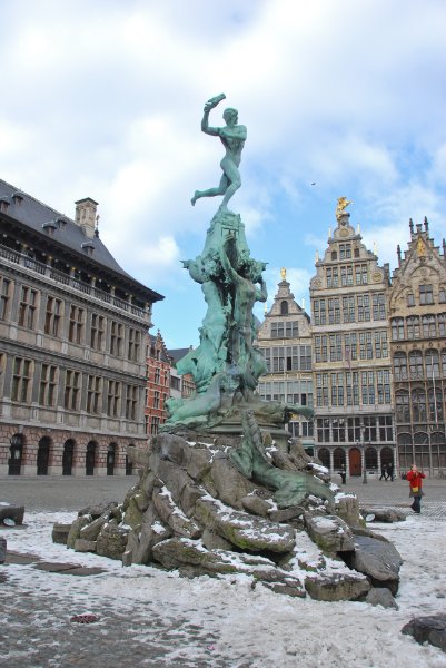 Antwerp021610-1457.jpg - Statue of Silvius Brabo by Jef Lambeaux, 1887, located in the center of the Grote Markt. Guildhouses (background)
