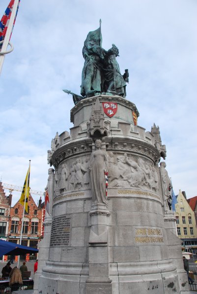Bruge021710-1607.jpg - Statues of Jan Breydel and Pieter de Coninck in the center of the Markt square