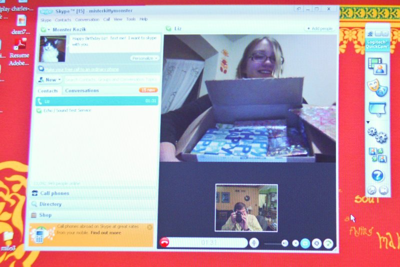 Liz21stBday020510-0704.jpg - Happy 21st Birthday!!  Celebrating Liz's Birthday.  She's opening her presents, over a Skype connection.