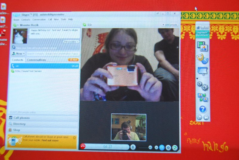 Liz21stBday020510-0705.jpg - Happy 21st Birthday!!  Celebrating Liz's Birthday.  She's opening her presents, over a Skype connection.