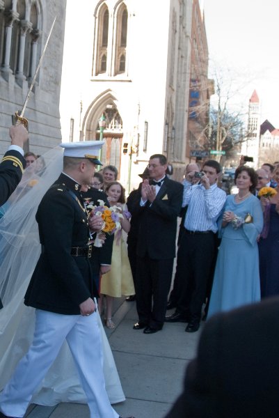 Syracuse041010-2215.jpg - Maureen and Tyson walking the traditional Sword Arch after their Wedding ceremony.  In front of the Cathedral of the Immaculate Conception.