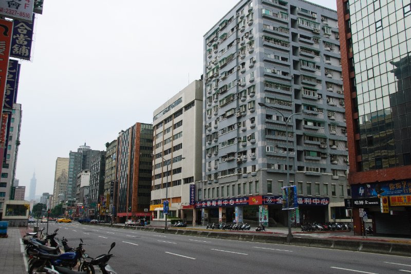 Taiwan060210-3113.jpg - Looking East on Zhong Xiao East Road. Taipei 101 Building, background left