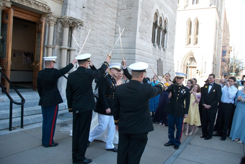 Syracuse041010-2213.jpg - Maureen and Tyson walking the traditional Sword Arch after their Wedding ceremony.  In front of the Cathedral of the Immaculate Conception.