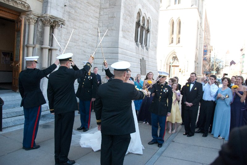 Syracuse041010-2214.jpg - Maureen and Tyson walking the traditional Sword Arch after their Wedding ceremony.  In front of the Cathedral of the Immaculate Conception.