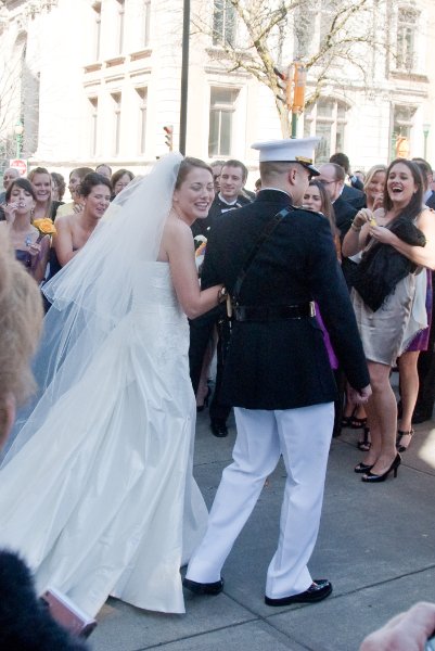 Syracuse041010-2217.jpg - Maureen and Tyson walking the traditional Sword Arch after their Wedding ceremony.  In front of the Cathedral of the Immaculate Conception.