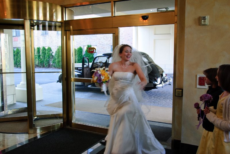 Syracuse041010-2243.jpg - Maureen back from the wedding in the lobby of the Genesee Grande Hotel just before the reception starts