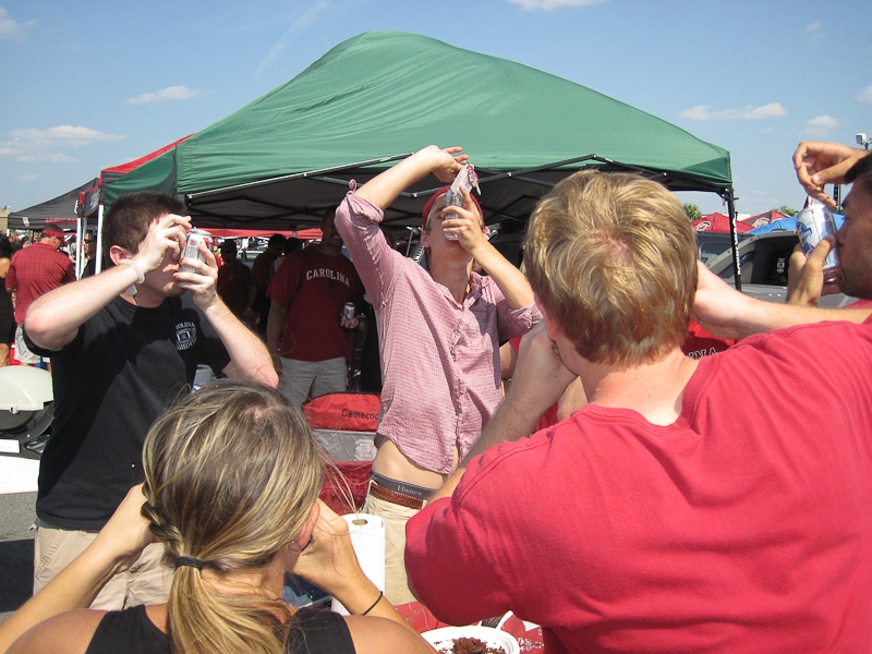 One last, "shotgunning" of beer before the Missouri vs USC football game.