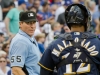 Umpire Angel Hernandez with Martin Maldonado. Cubs v Brewers 9/1 Umpire Angel Hernandez with Martin Maldonado. Cubs v Brewers 9/1