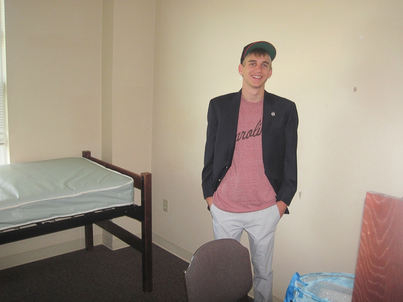Mike checking out of his room in East Quad
